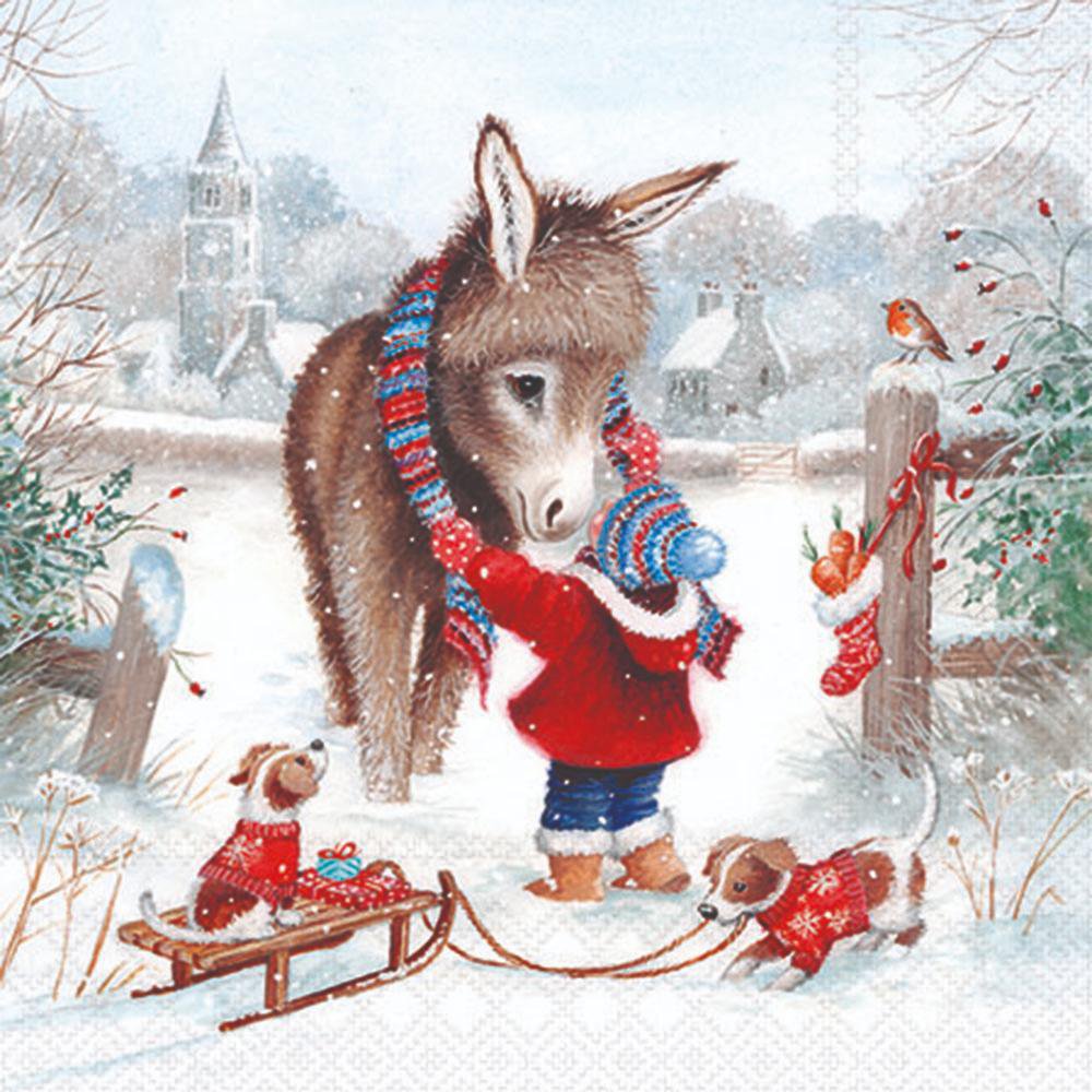 Donkey in a winter scene with a child and two dogs on a sled, all wearing winter clothing.