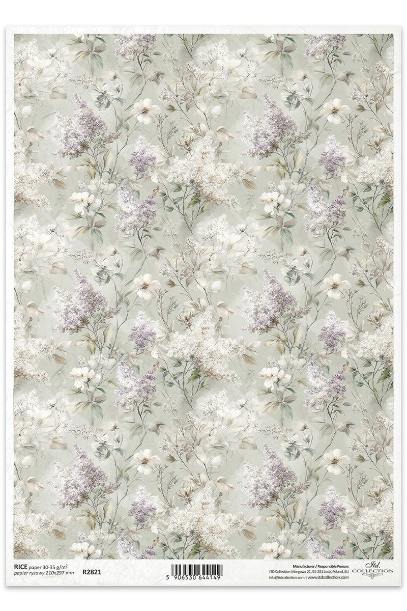 Floral patterned paper with small flowers on a light green background