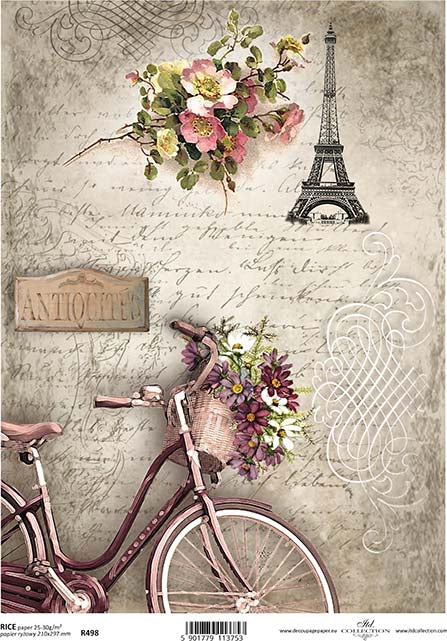 Rice paper with a printed design featuring a bicycle, floral elements, and the Eiffel Tower, with a vintage aesthetic.