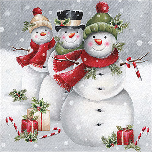 Three cute smiling snowmen in a festive winter scene.