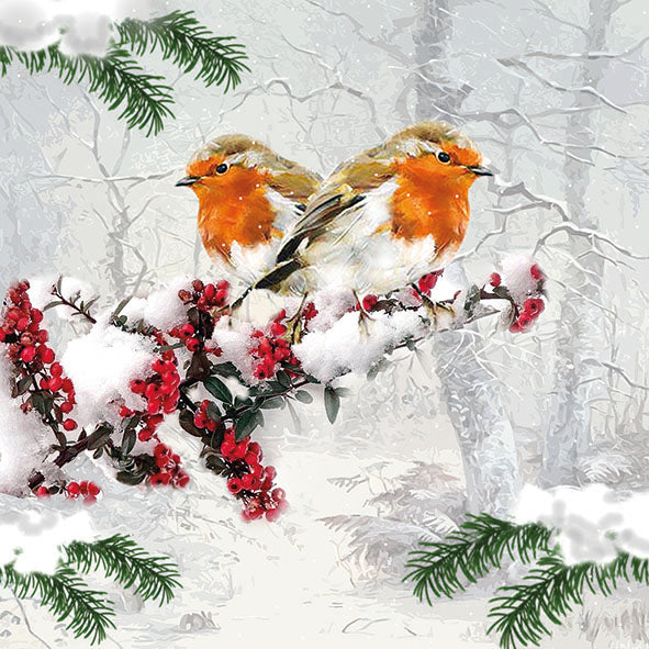 A paper napkin with an illustration of two red-headed birds perched on branches with snow on the ground and around them.