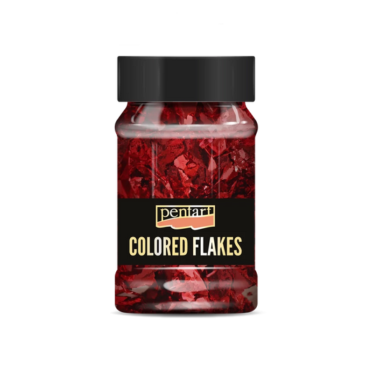 Bottle of red coloured flakes with a black lid 