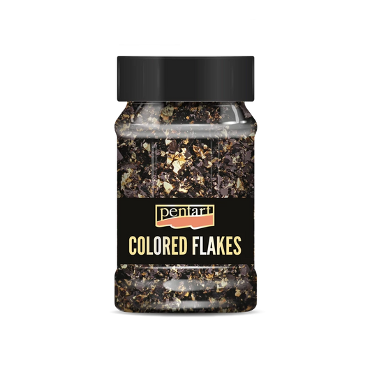 Bottle of colorued flakes with a black lid.