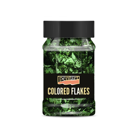 Bottle of green coloured flakes with a black lid