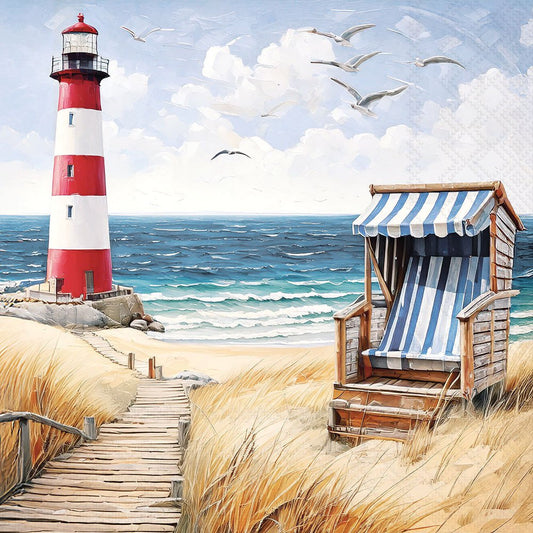 Lighthouse and beach chair with striped awning on a sandy shore with ocean and sky in the background