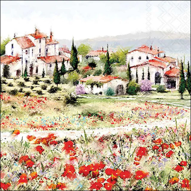 Village with red-roofed houses and a field of flowers in the foreground