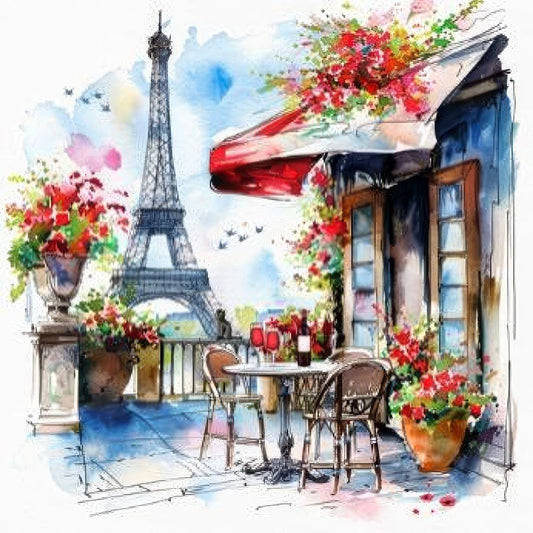 A small café with a table and chairs, flowers around, and the Eiffel Tower in the background