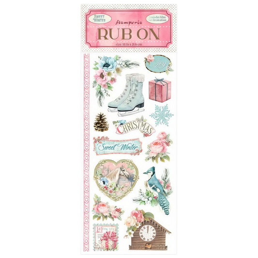 Rub-on transfer sheet with winter-themed designs on a white background