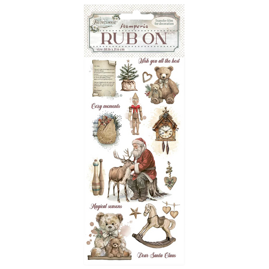 Collection of Christmas-themed rub-on transfers with Santa Claus, reindeer, and other festive elements on a white background.