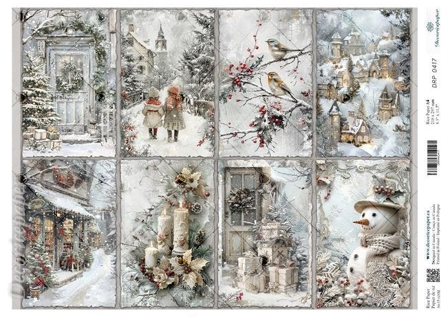 A sheet of decorative rice paper paper featuring a winter village scene with snow-covered houses, snowman figures, birds, and floral details.