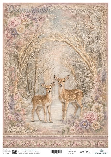 A square decorative paper card or art print featuring two deer standing in a snowy woodland scene with roses and delicate lace-like floral borders. 