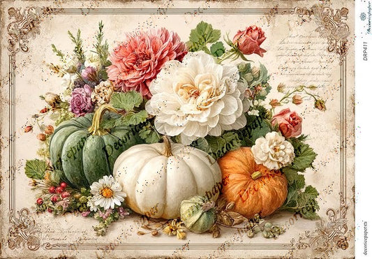 Decorative arrangement of pumpkins and flowers with an ornate frame.