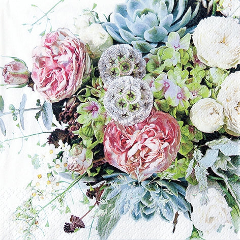 Close-up of a bouquet with pink roses, greenery, and white flowers on a light background