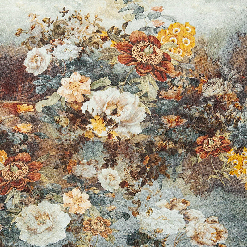 Close-up of a floral arrangement with various colors on a textured background