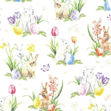 Pattern of bunnies and flowers on a white background