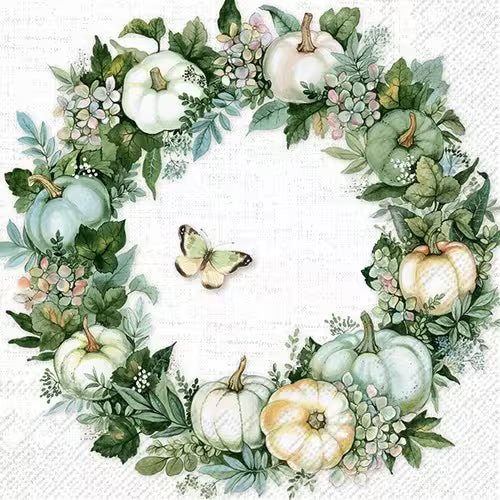 Decorative wreath with pumpkins and greenery on a white background