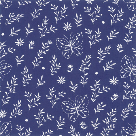 White floral and butterfly pattern on a blue background