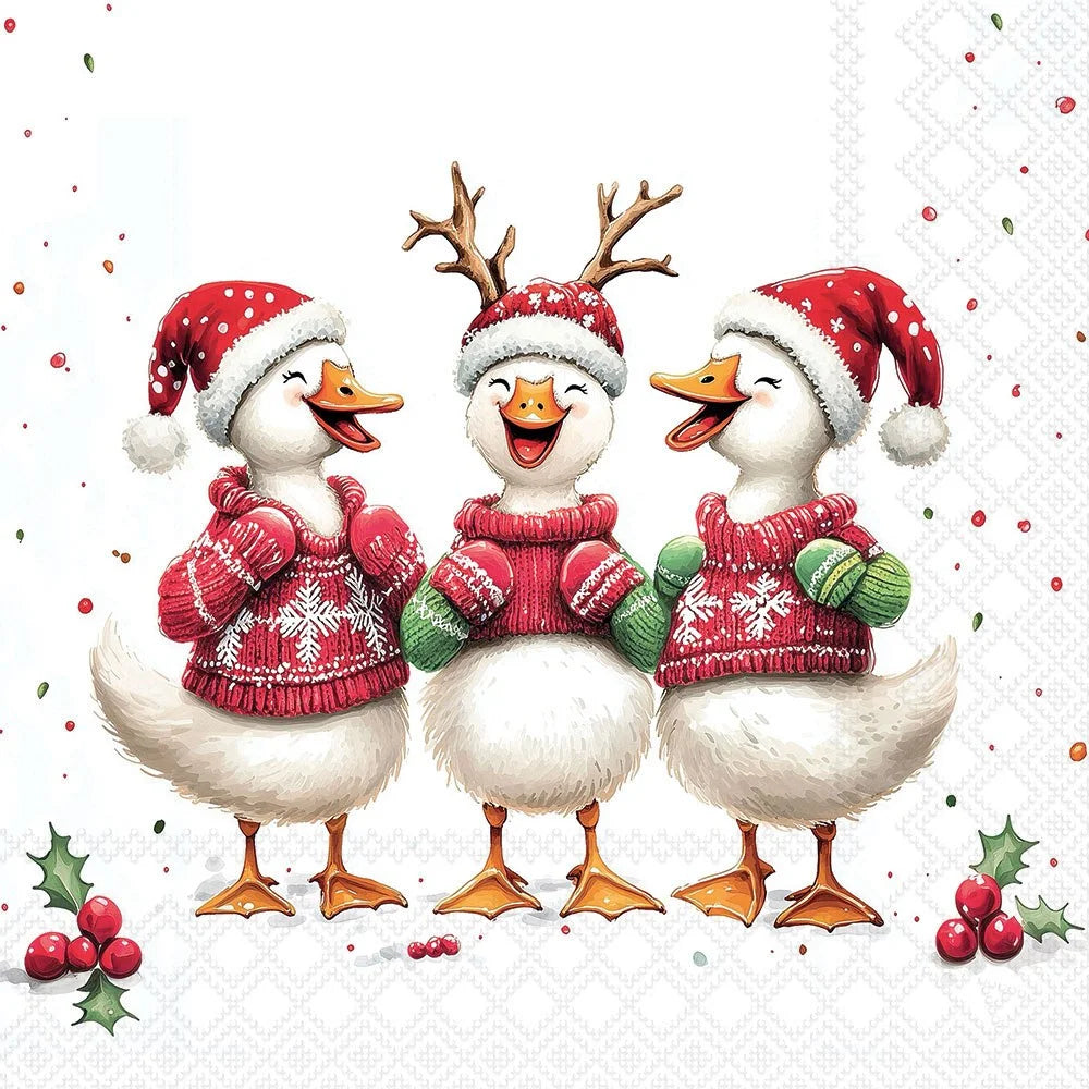 Three festive white ducks wearing red Santa hats and knitted holiday sweaters, standing together on a white patterned background with small red berries and holly accents.