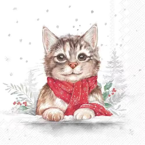 A cute kitten in the snow wearing a red scarf, with winter greenery in the background.
