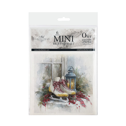 A packaged set of six mini rice papers from itd Collections, featuring a winter holiday design with ice skates, a lantern, pine branches, and red berries on a white background.