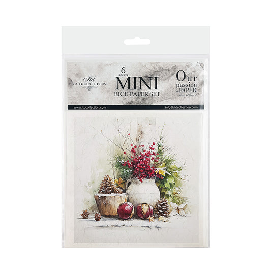 A packaged paper craft set labeled 'Mini Rice Paper Set' with a winter still life illustration featuring a white vase, red berries, pinecones, and red apples on a light background.