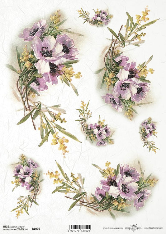 Decorative paper sheet with purple flowers and green leaves on a white background