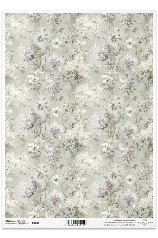 Floral patterned paper with small flowers on a light green background