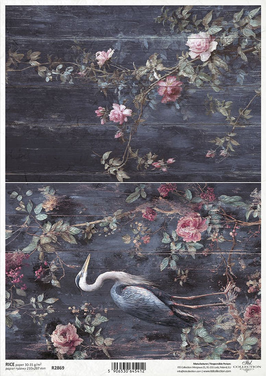 A sheet of decorative paper featuring a dark rustic wood background with pink roses, green leaves, and a blue-gray heron.