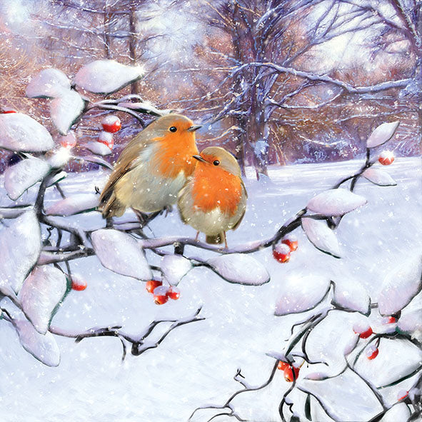 Two robins on a snow-covered branch with a winter landscape background