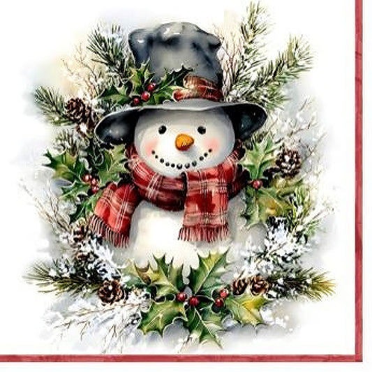A smiling snowman wearing a hat and red scarf, surrounded by holly, pine branches, and winter greenery