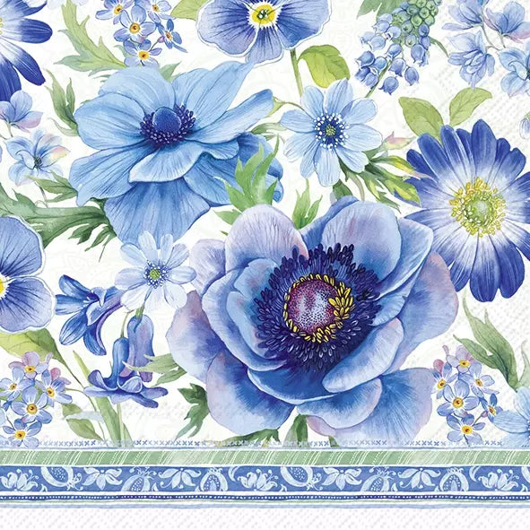 Pattern of blue flowers with green leaves on a white background