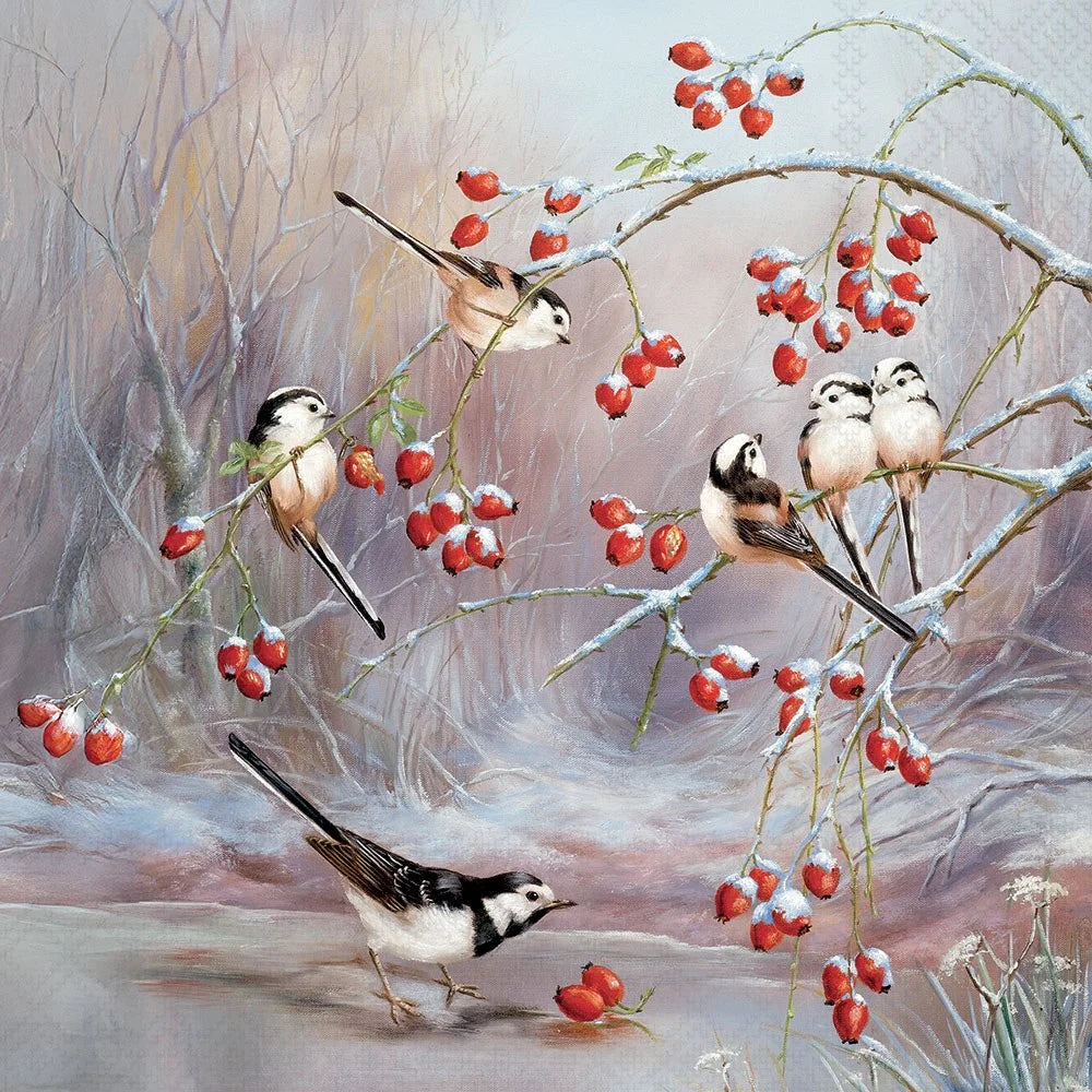 A detailed winter bird painting featuring several small black-and-white tits perched on snow-dusted branches laden with bright red berries against a soft, muted gray and beige forest background.