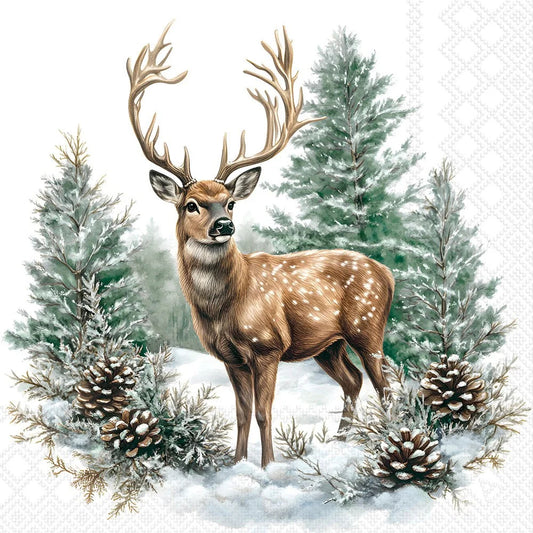 A deer with large antlers standing in snowy ground among evergreen trees and pinecones, printed on a white patterned surface that appears to be a napkin or paper product.